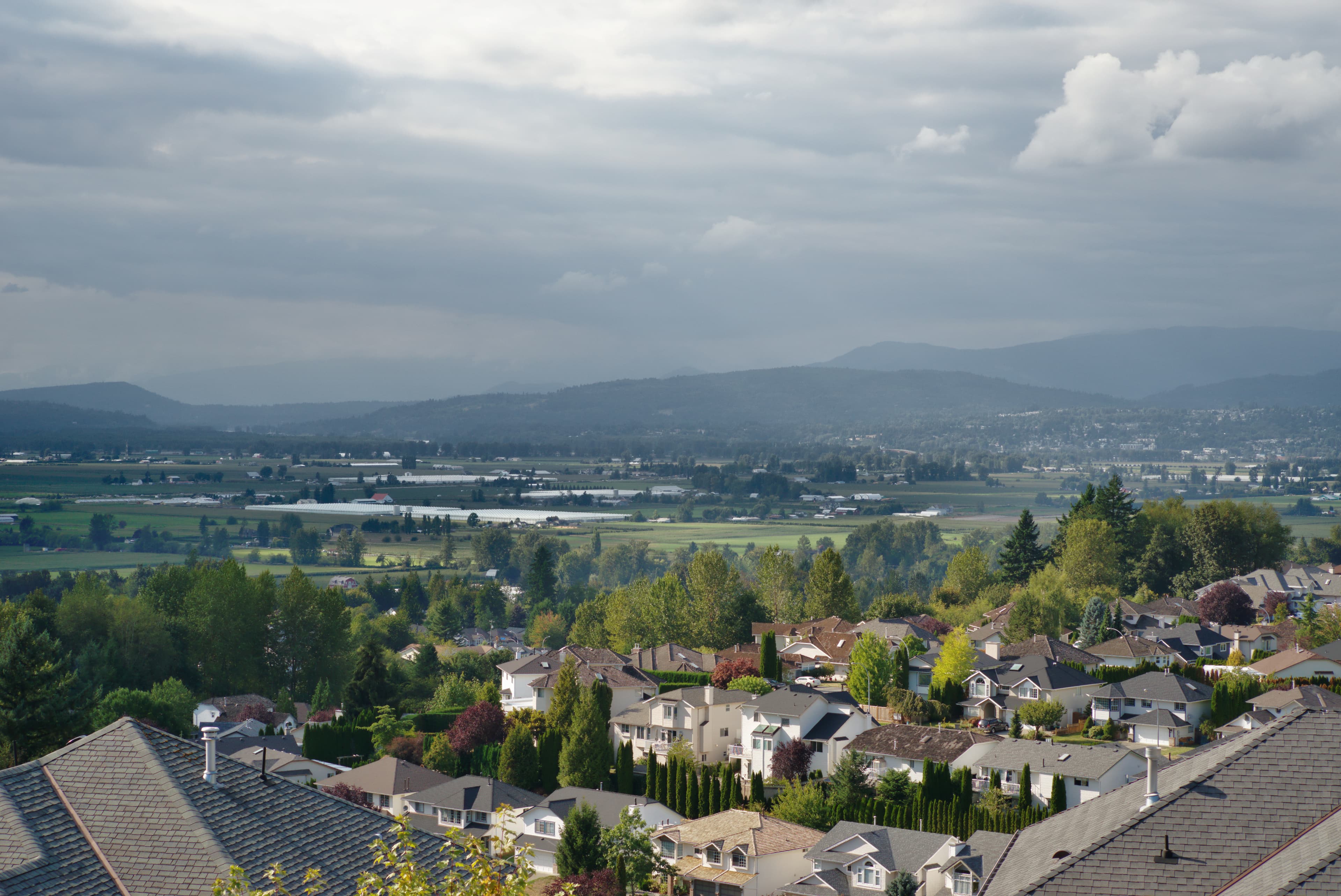 A view across East Abbotsford toward Mission and the surrounding mountains.