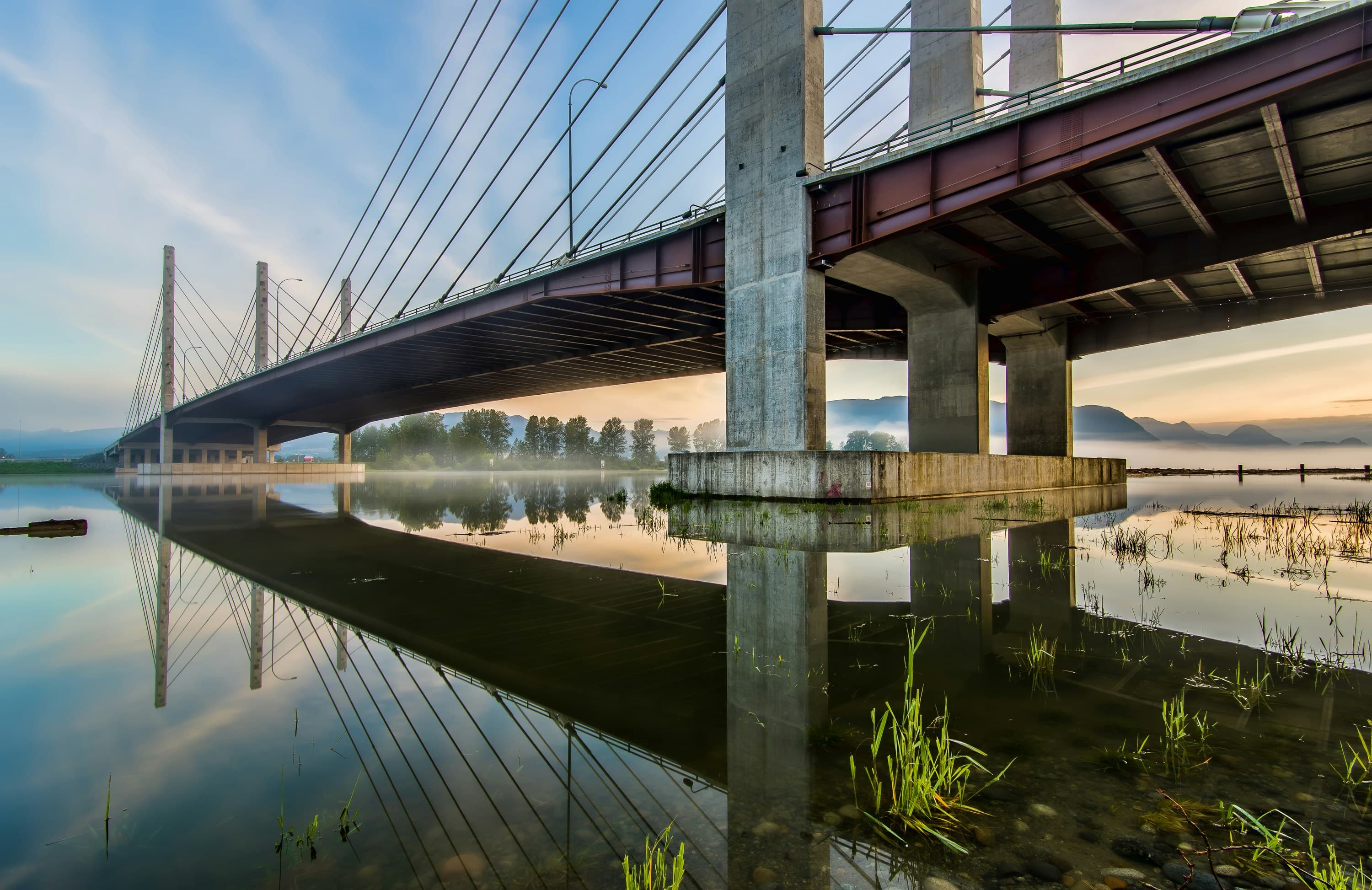 Pitt River Bridge and mountain view in Port Coquitlam, British Columbia.